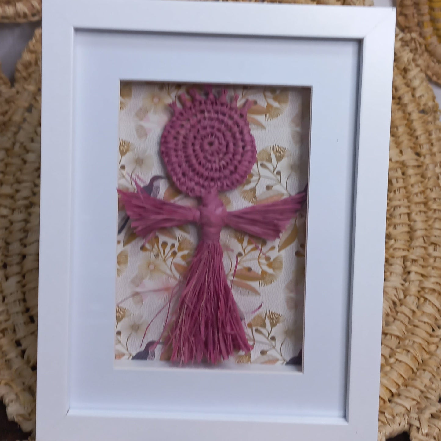 framed indigenous weaving spirit doll